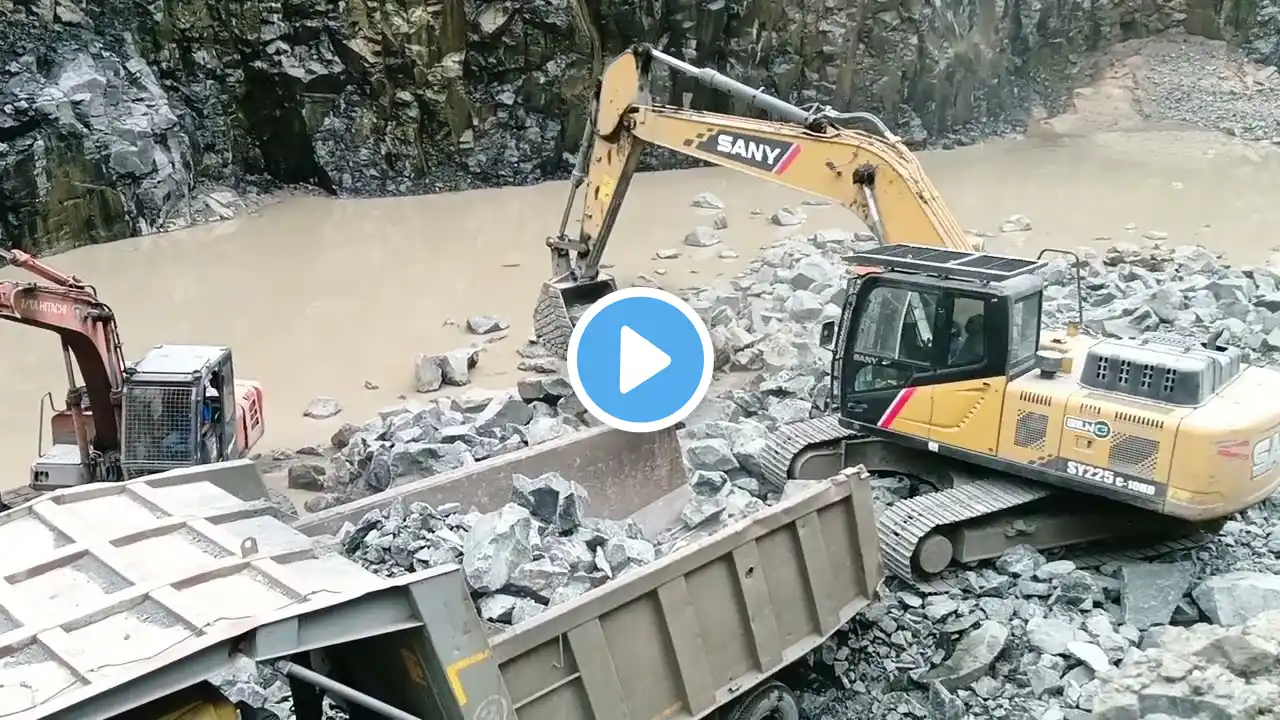 Bharat Benz loading trucks and SANY Excavator working