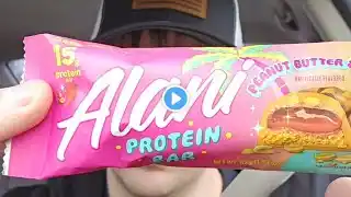 peanut butter and jelly alani protein bar