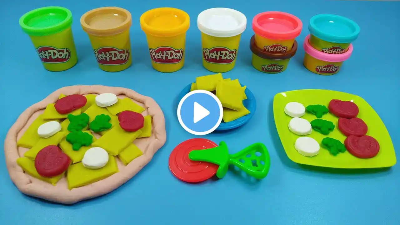 Making fun pizza with Play-Doh. Toy food from modeling clay, play dough.