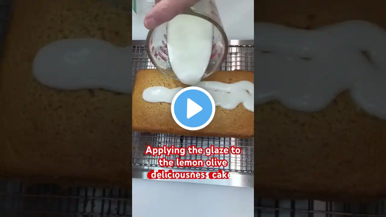 Applying the delicious lemon glaze olive oil lemon cake. #cake #cakerecipes #icingonthecake #shorts