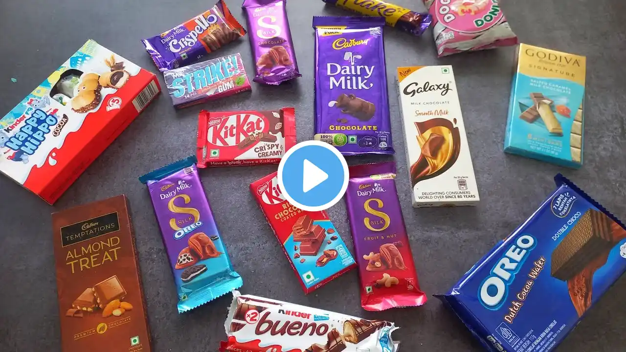 100 candies opening, chocolate a video, lots of chocolates, Cadbury celebration, surprise toys