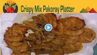 Crispy Mix Pakoray Platter – A crunchy combo of potatoes, baingan, and paneer dipped in a spicy,