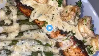 Blackened Salmon w/ blackened shrimp & homemade herb butter cream sauce