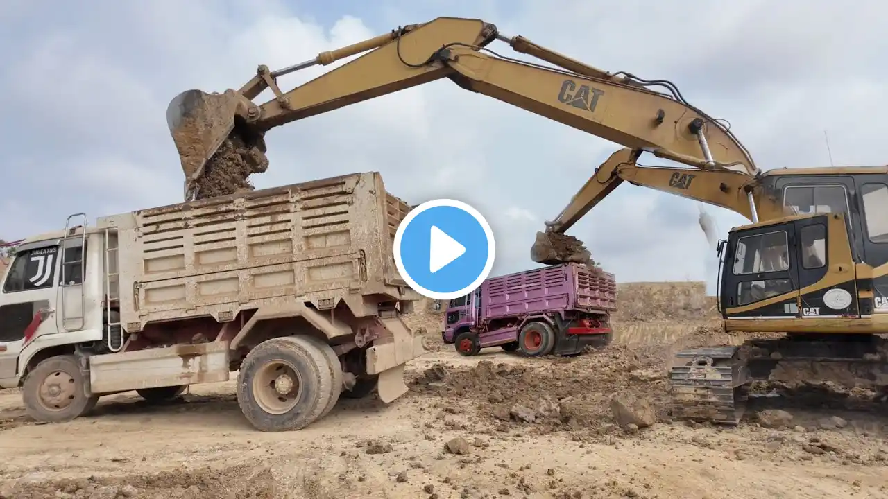 Excavator Dump Truck Digging Limestone On Road Construction Rega 32 Cat